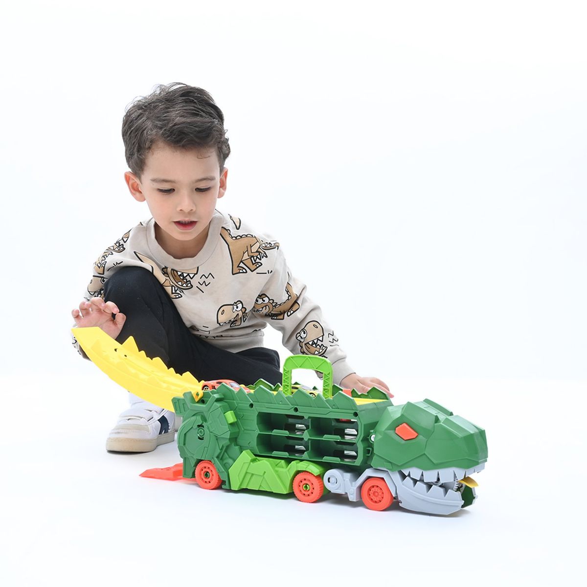 KIDS N PLAY - Maletín dinosaurio, set de carros de juguete. Incluye 2 autos de aluminio