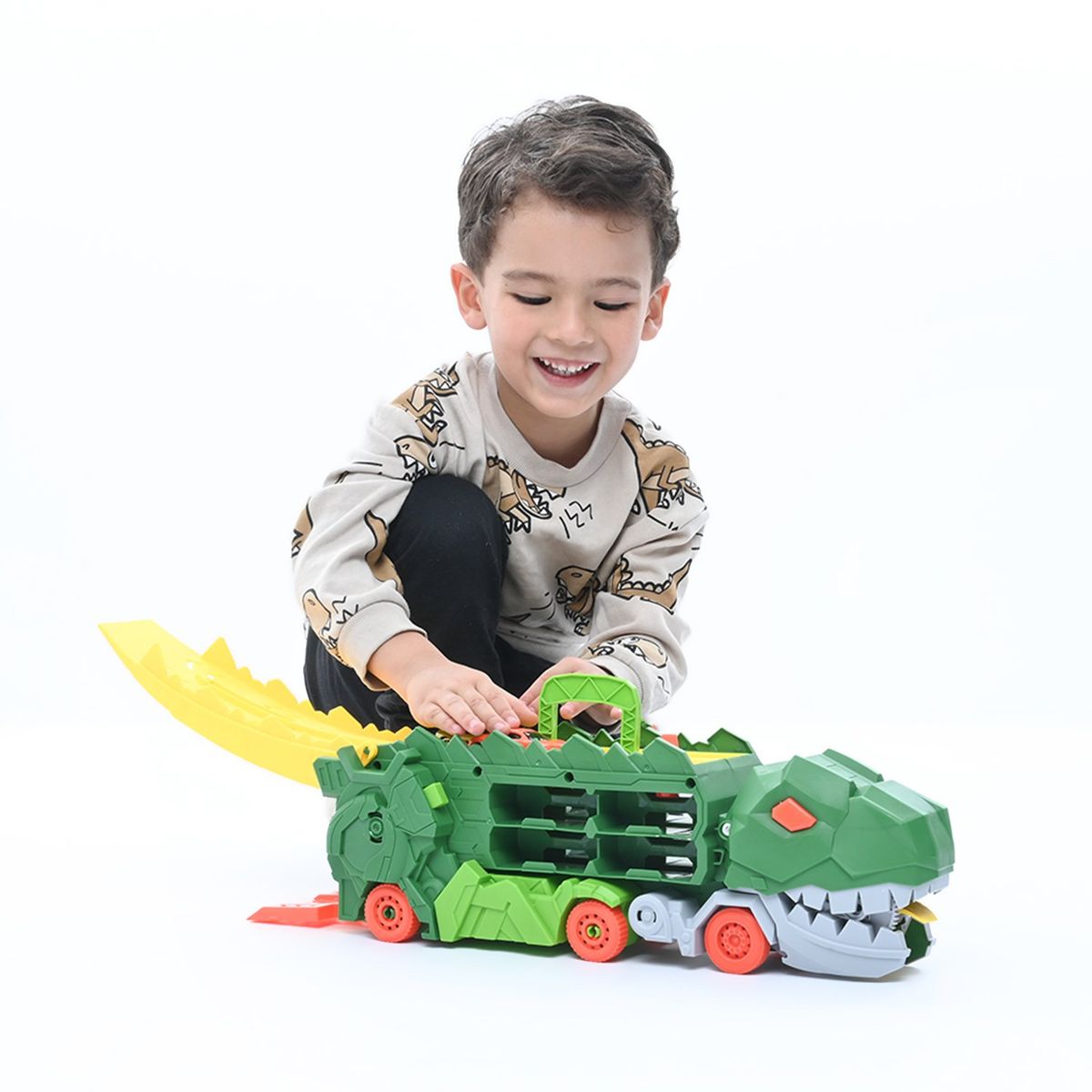 KIDS N PLAY - Maletín dinosaurio, set de carros de juguete. Incluye 2 autos de aluminio