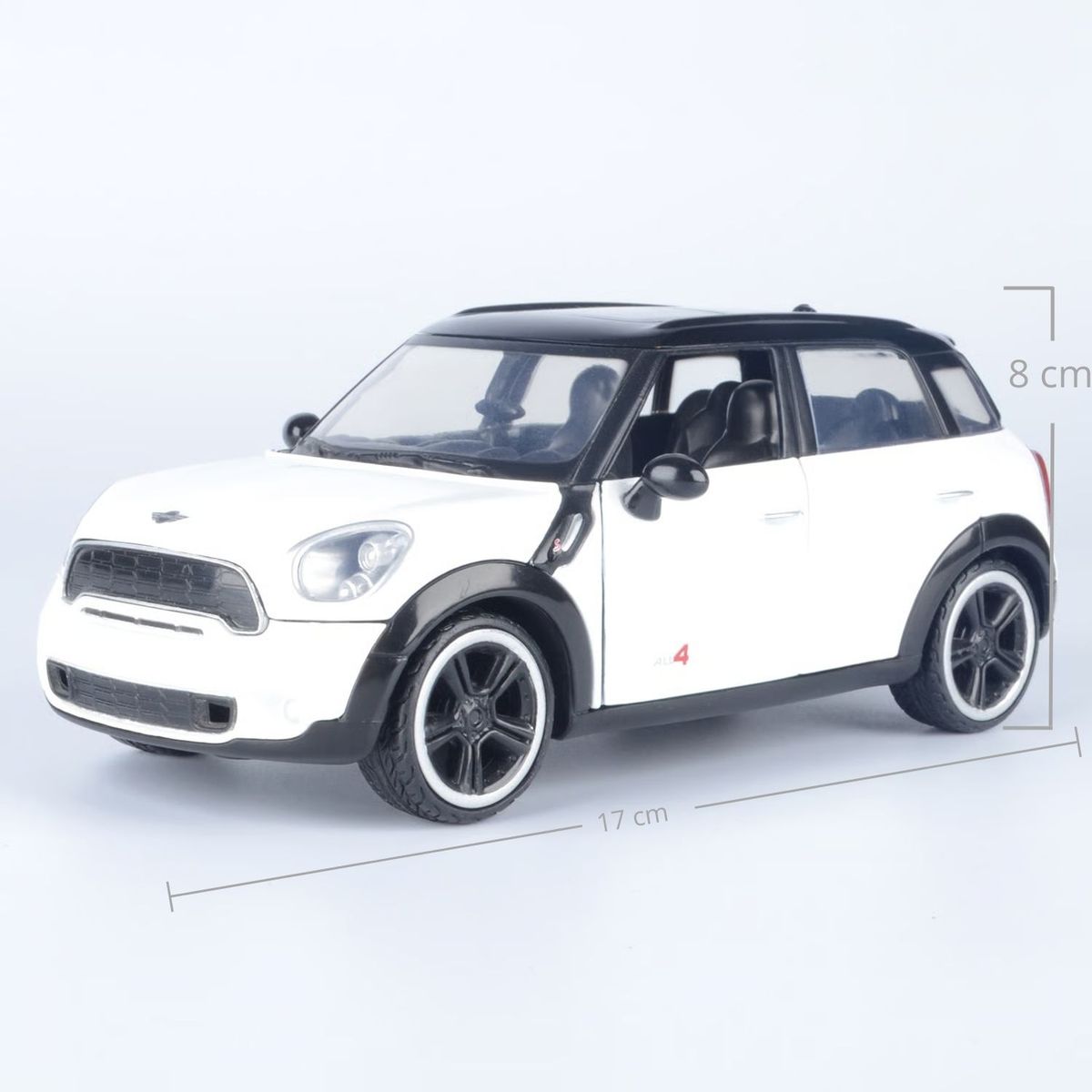 MOTORMAX - Carro Mini Cooper S Countryman 2011 Coleccionable escala 1:24 Sorpresa