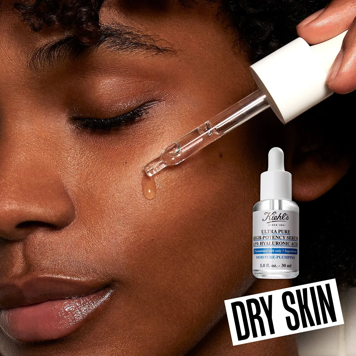 Woman applying hyaluronic acid serum for dry skin