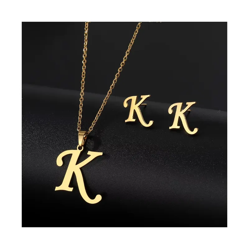 SIFRAH SHOP - Collar y Aretes de Acero Dorado Dije Letra Inicial K Con Caja