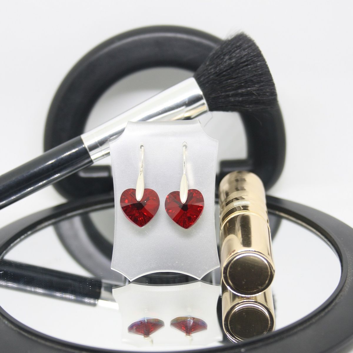 FERNANDA ROMERO JOYAS Y ACCESORIOS - Aretes "Corazón de Cristal"  - Rojos Brillantes con Plata