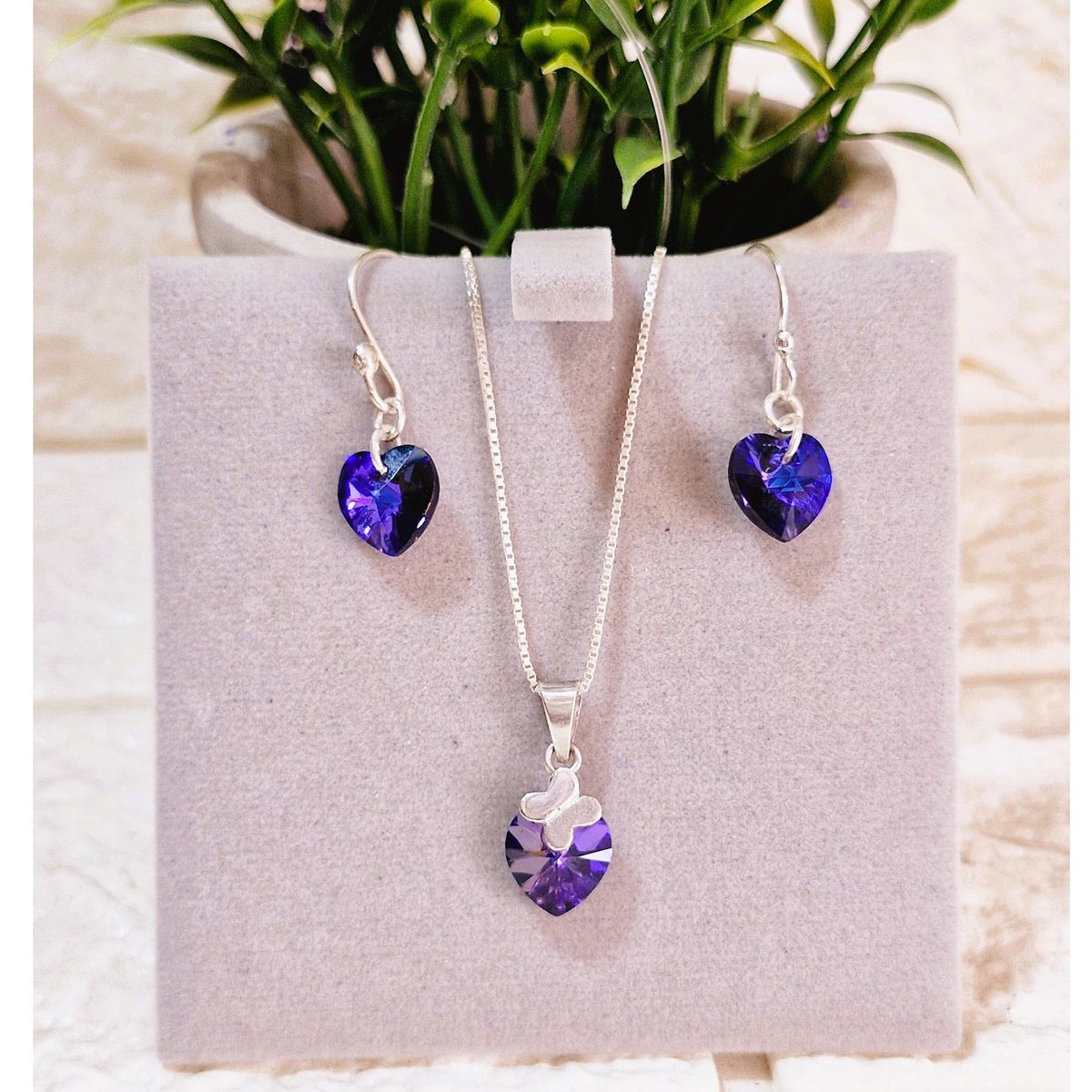 FERNANDA ROMERO JOYAS Y ACCESORIOS - Juego Corazón Tornasolado Púrpura Brillante - Plata nacional y Cristal