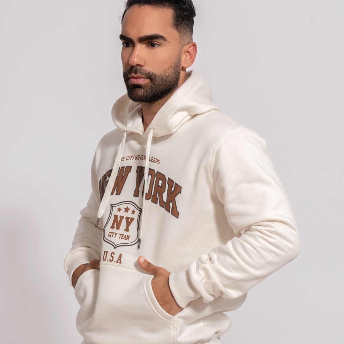 GENERICO - Polera hoddie de algodón afranelado new york crema Arcoi