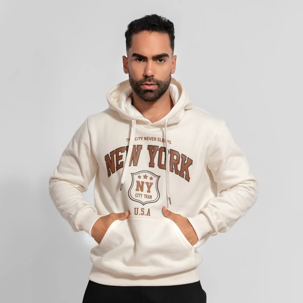 GENERICO - Polera hoddie de algodón afranelado new york crema Arcoi