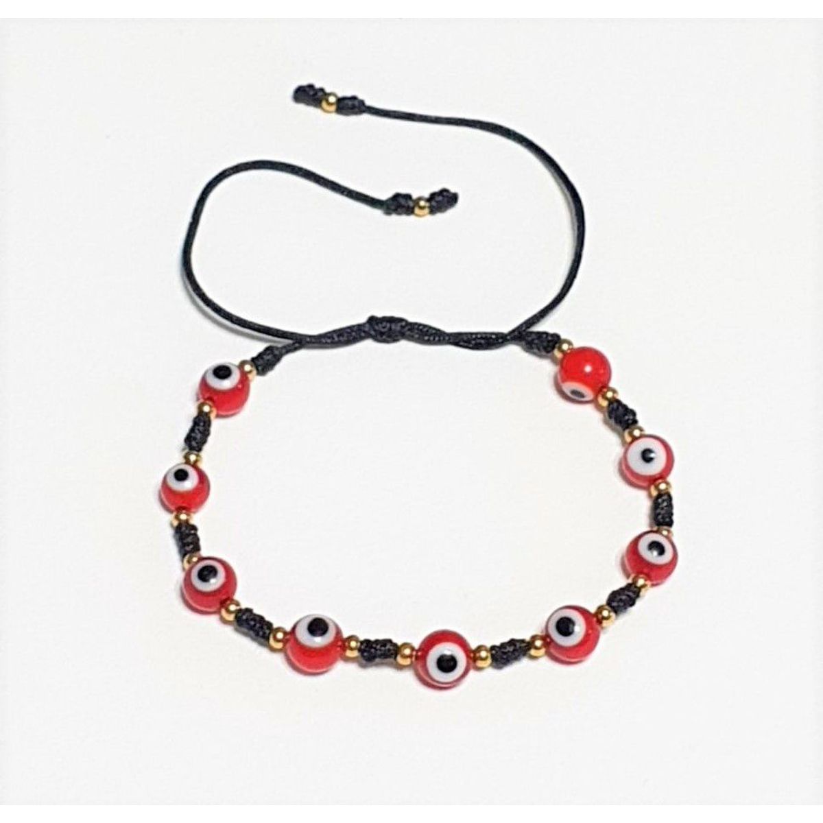 FERNANDA ROMERO JOYAS Y ACCESORIOS - Pulsera Ojo Turco Rojo  CORAJES - con Billas de Acero