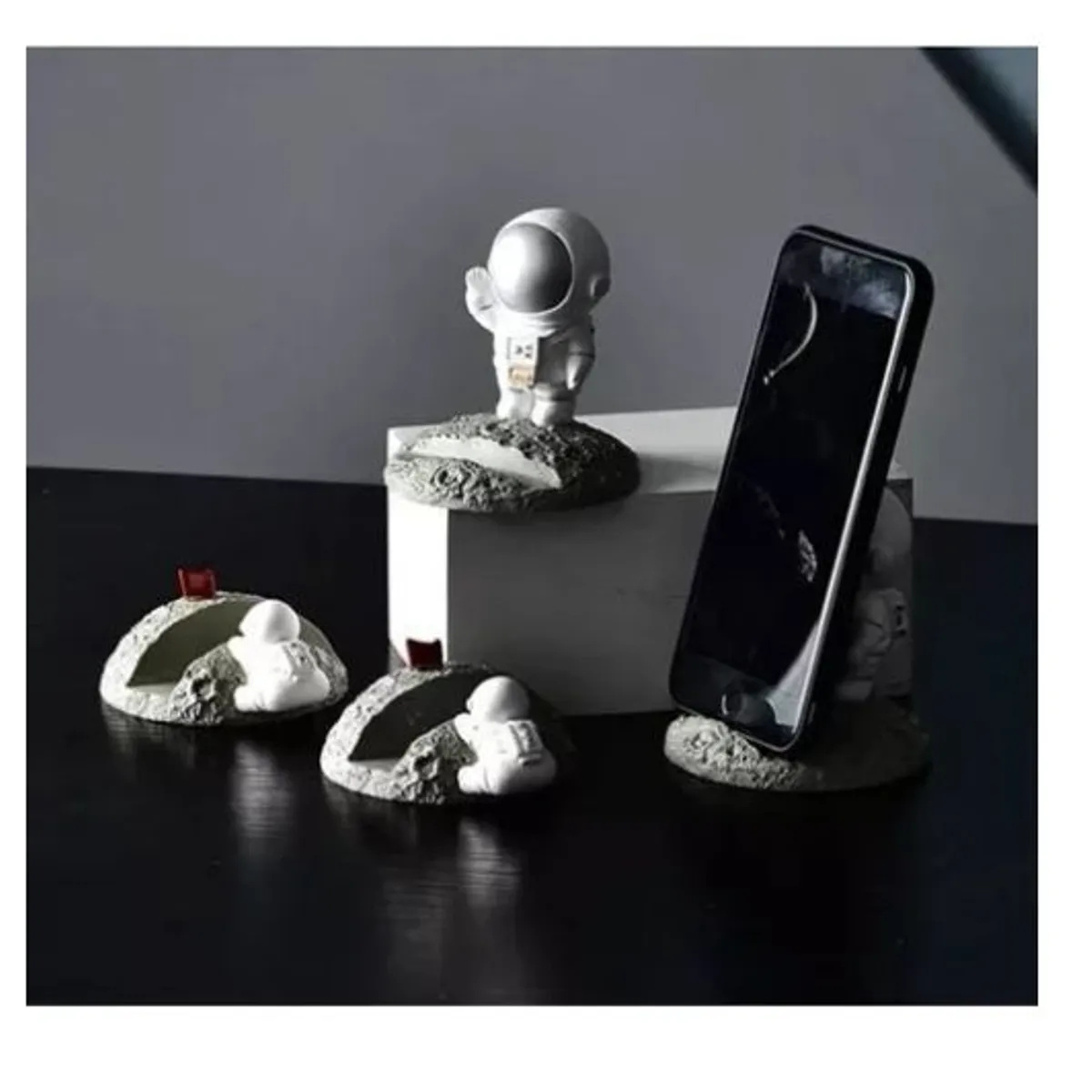 GENERICO - SOPORTE CELULAR  ASTRONAUTA SALUDANDO