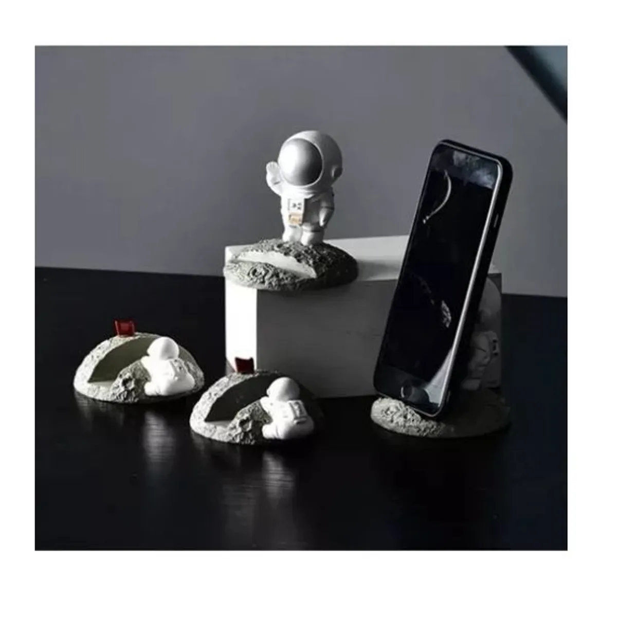 GENERICO - SOPORTE CELULAR  ASTRONAUTA SALUDANDO