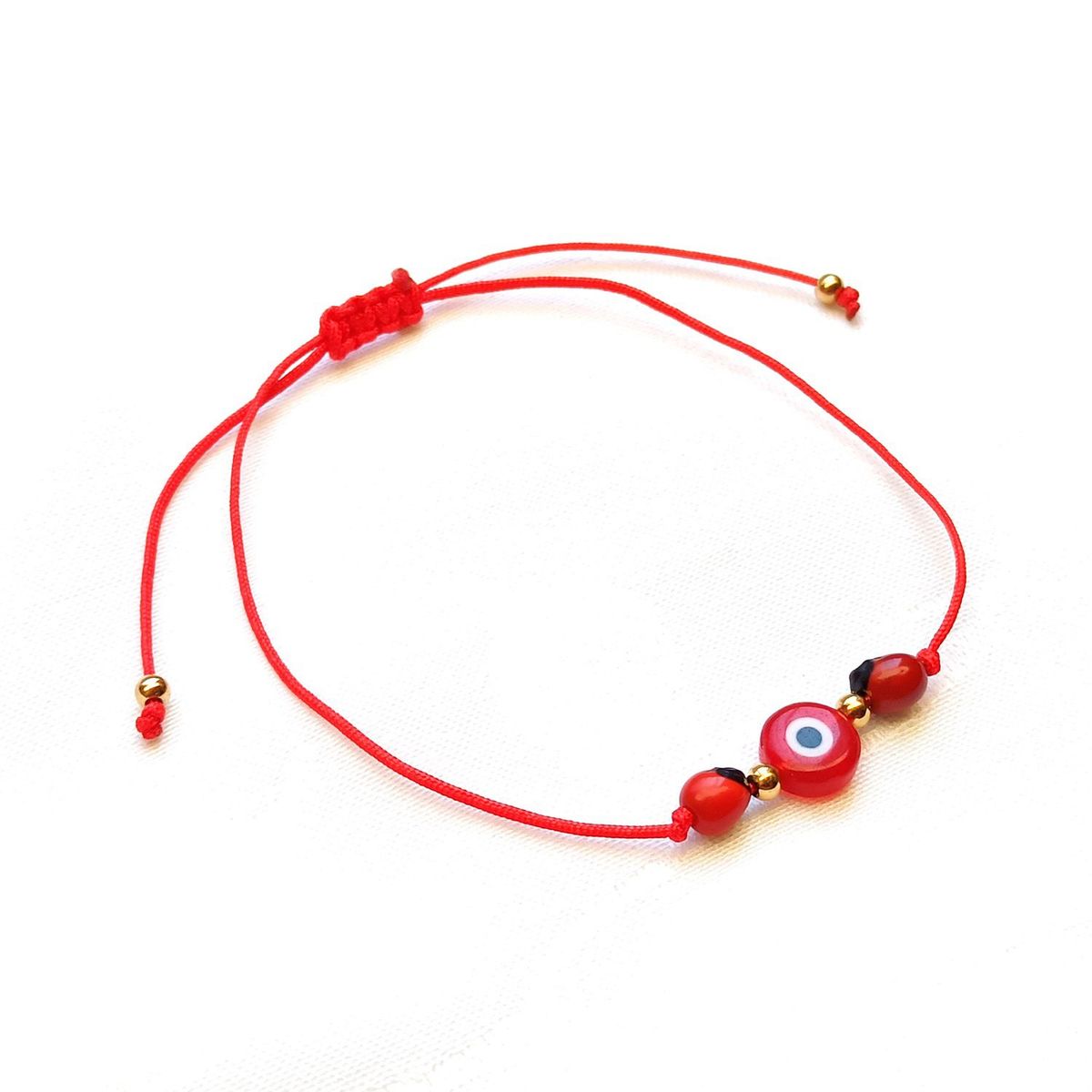 GENERICO - Pulsera de Hilo con Huayruro Ojo Turco y Billas Acero