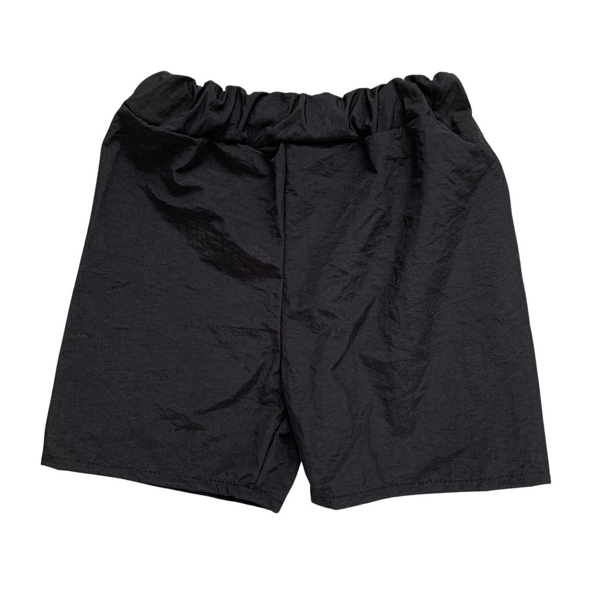 RED CARROT - Short unisex niño tela mojada negro entero