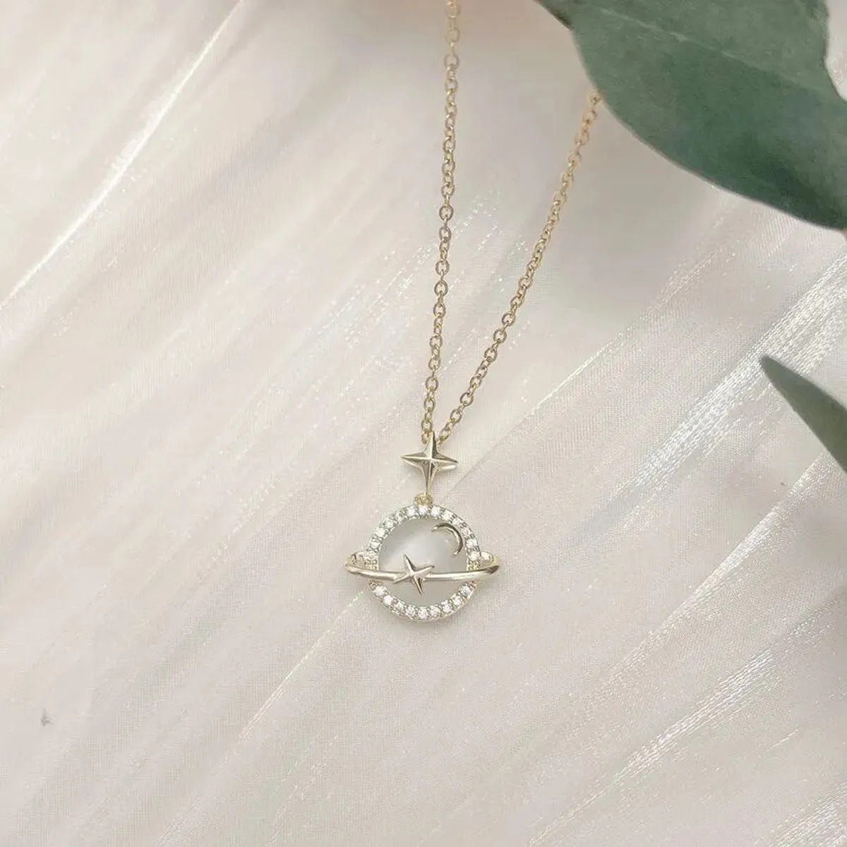 GENERICO - Collar cadena saturno dorado