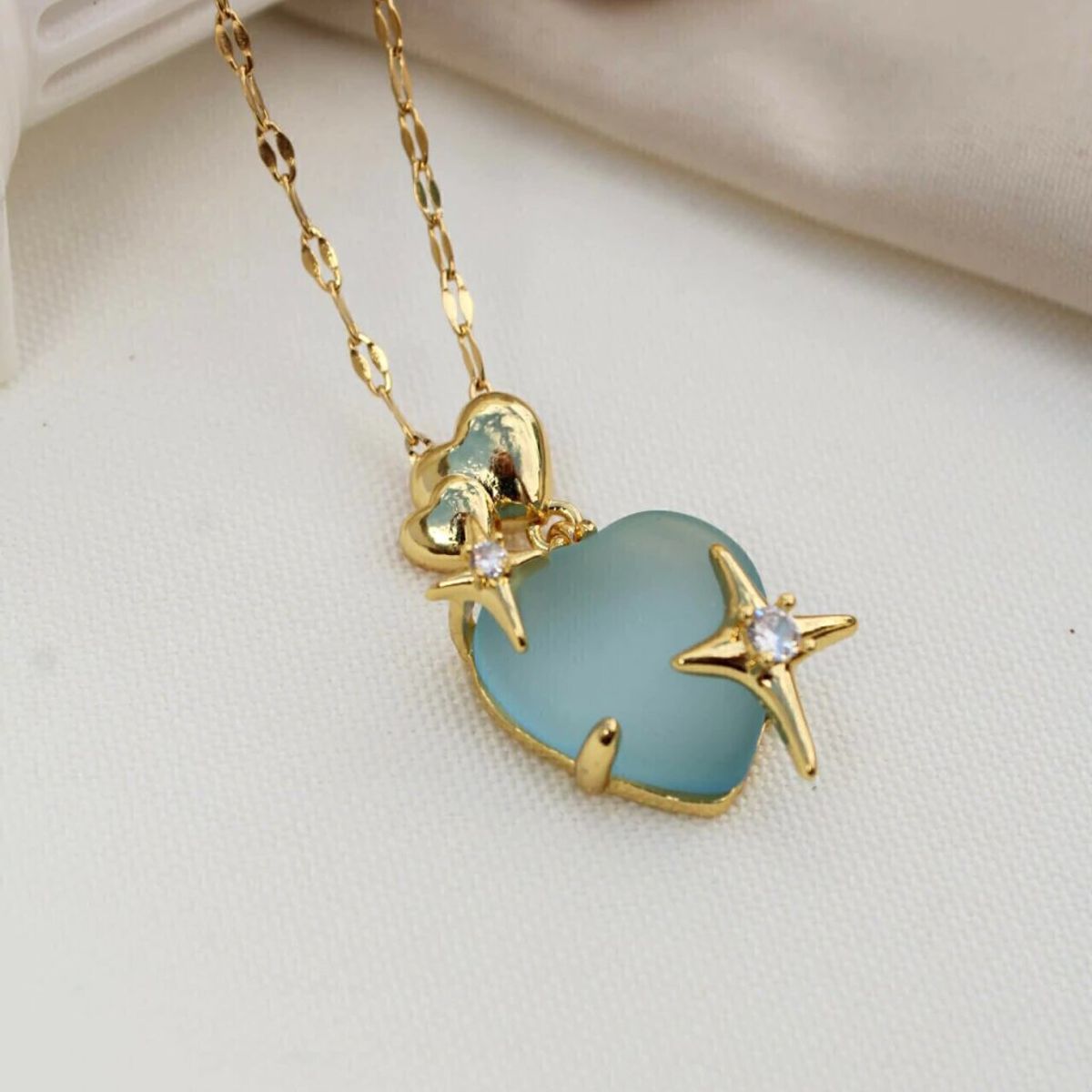 GENERICO - Collar corazón celeste