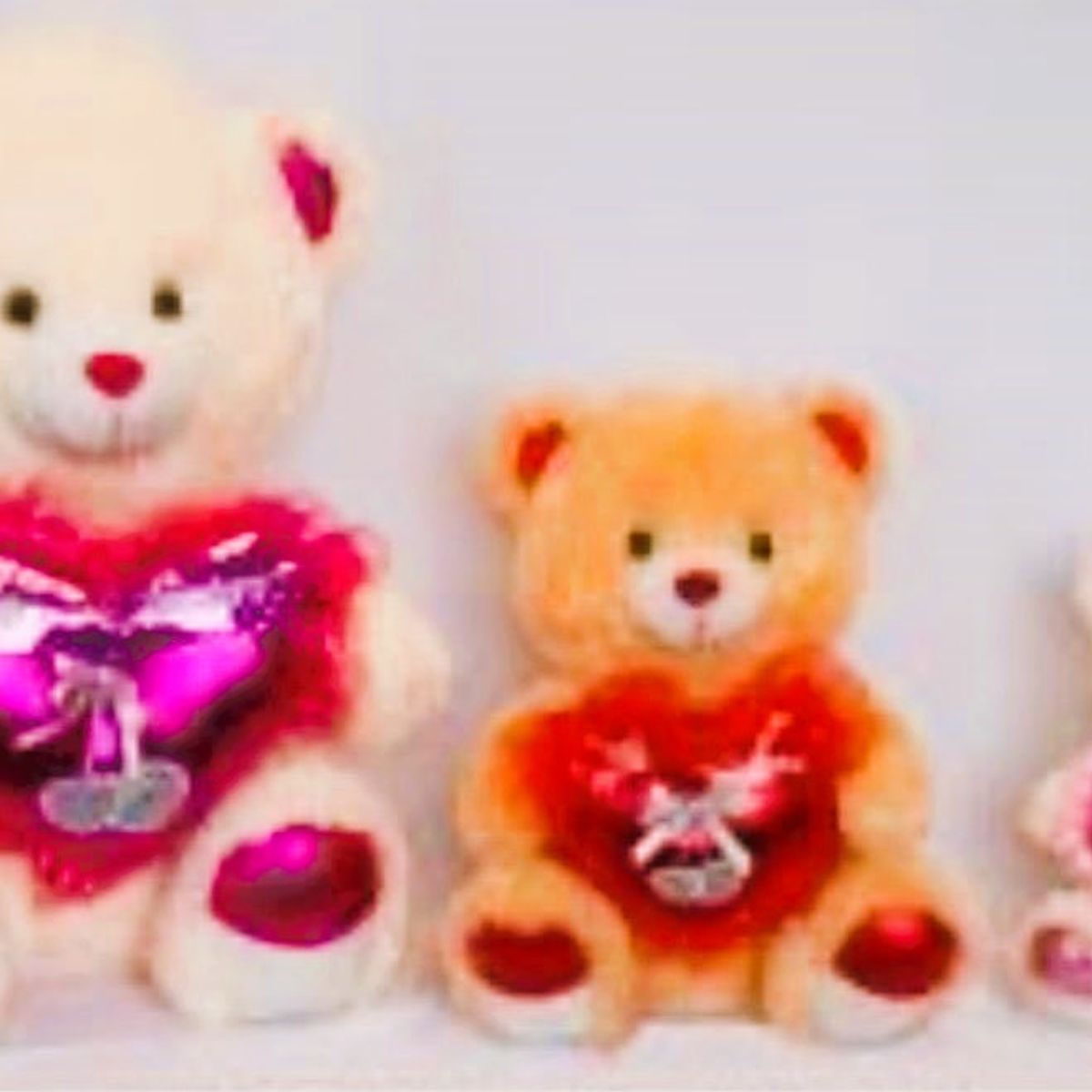 GENERICO - Peluche Oso CON CORAZON Y PATA PLATEADA MUSICAL