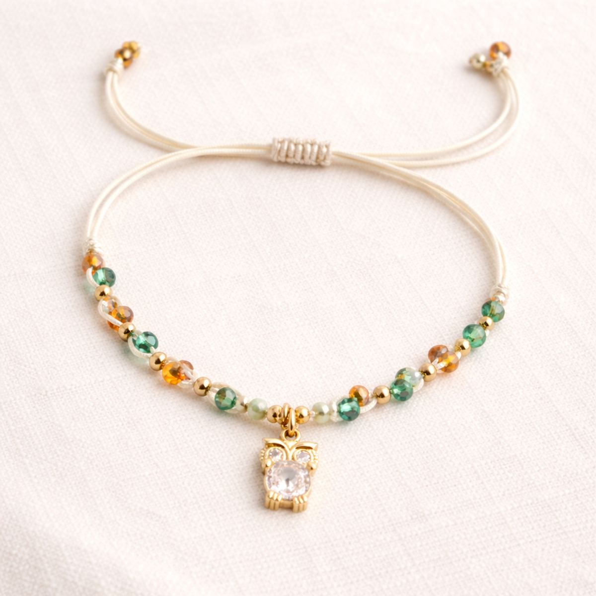 FERNANDA ROMERO JOYAS Y ACCESORIOS - Pulsera Buho Sabiduría - Tejida a Mano Cristales engastados y Acero