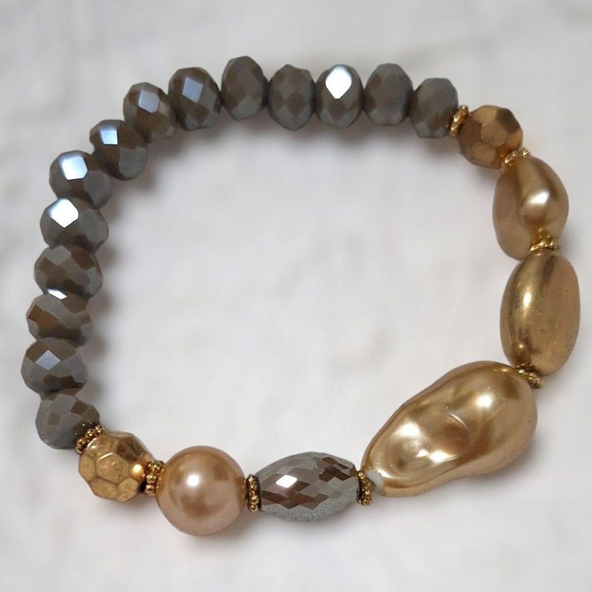 GENERICO - Pulsera con piedras de fantasía de color dorado y plata