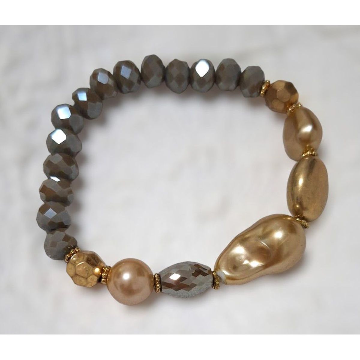 GENERICO - Pulsera con piedras de fantasía de color dorado y plata