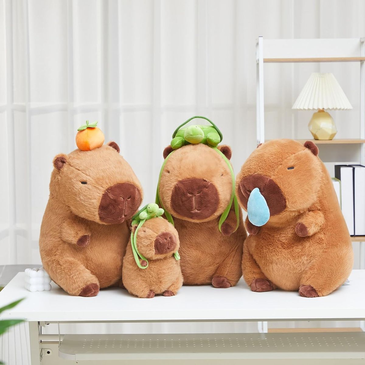 XCLUSIVE - CAPIBARA CAPYBARA CON NARANJITA KAWAII SUAVE 20CM IMPORTADO