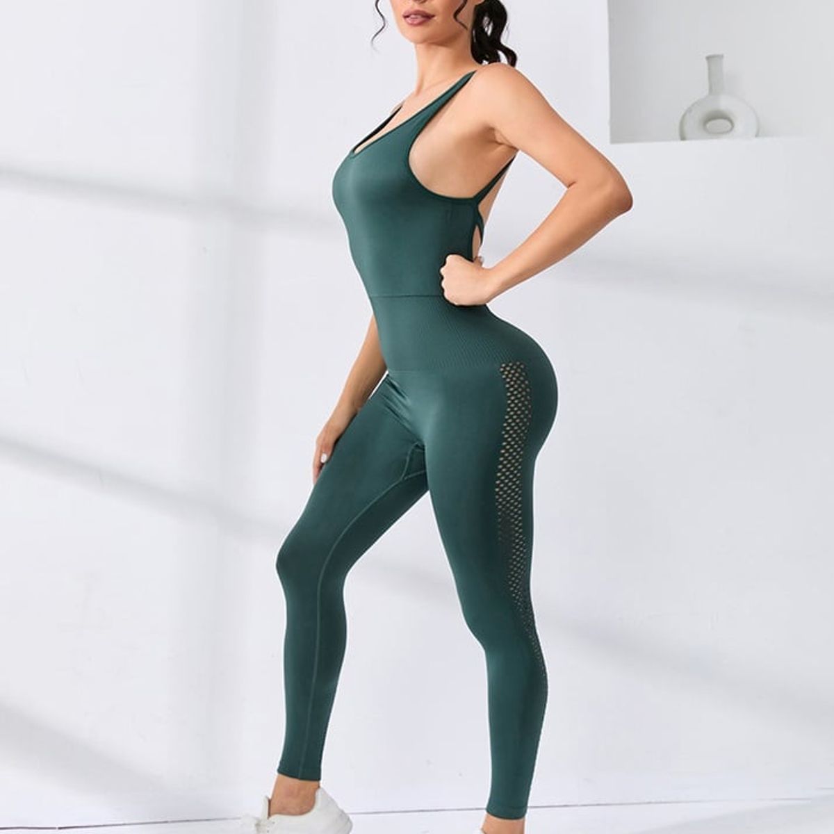 IMPORTADO MC - ENTERIZO DEPORTIVO VERDE CON ENCAJE A LOS COSTADOS