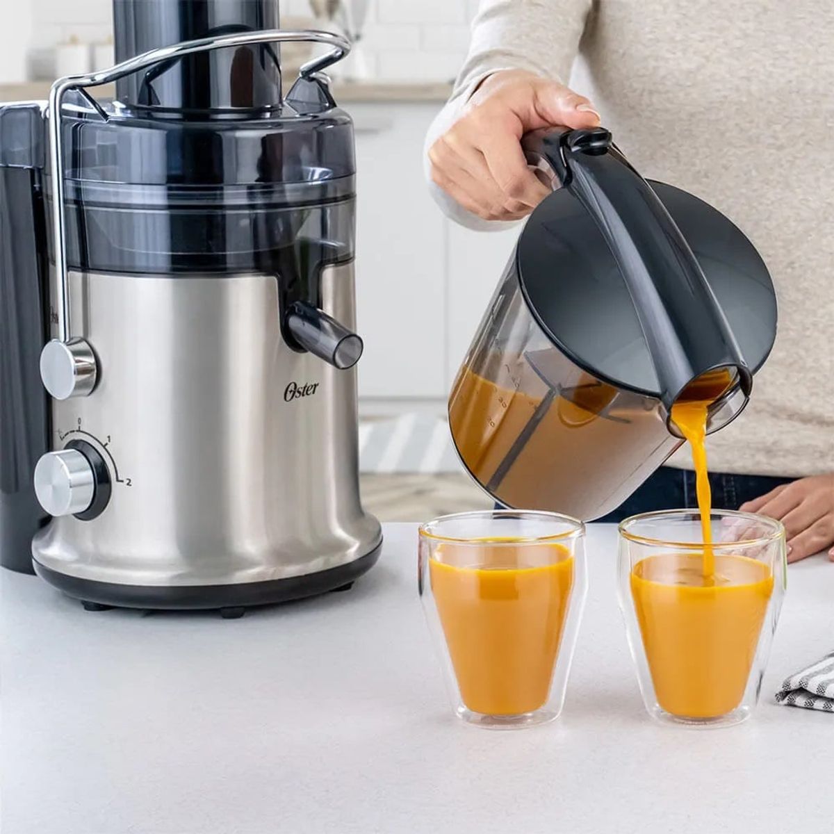 OSTER - Extractor de Jugos Oster Acero 600W