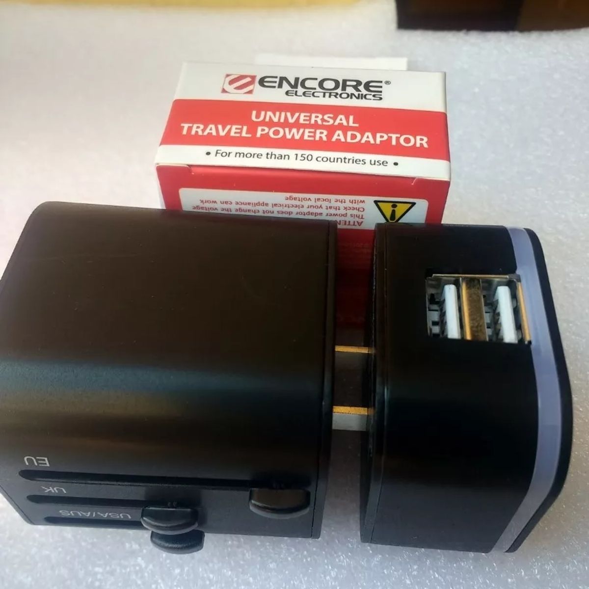 ENCORE ELECTRONICS - ADAPTADOR ENCHUFE  VIAJERO USB 2.0
