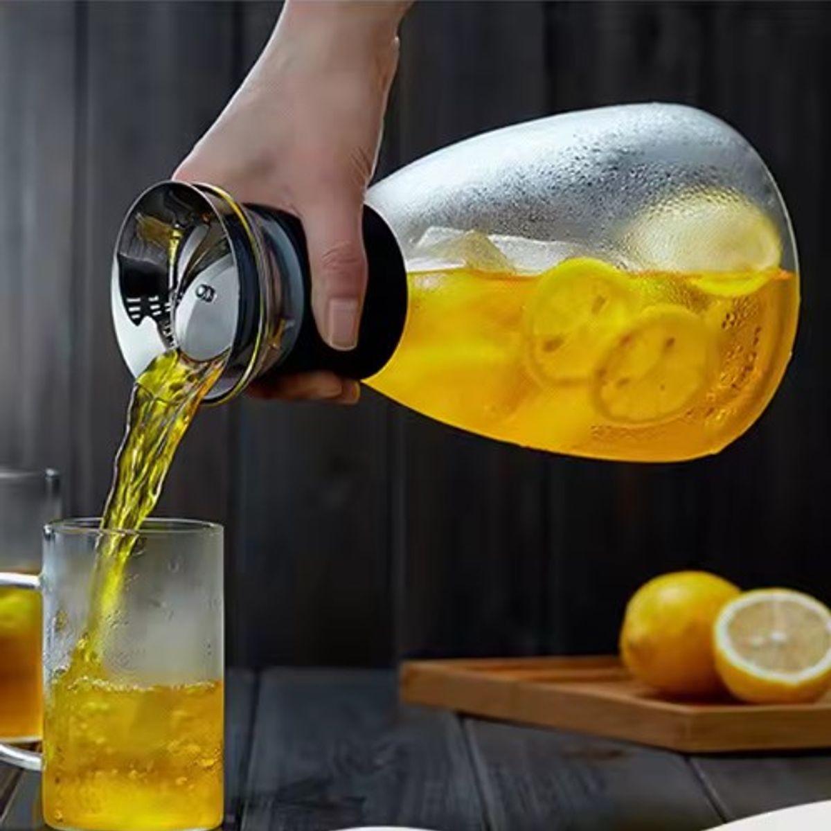 GENERICO - Jarra Vidrio Con Tapa Antigoteo de Acero Inoxidable  1500 ML.