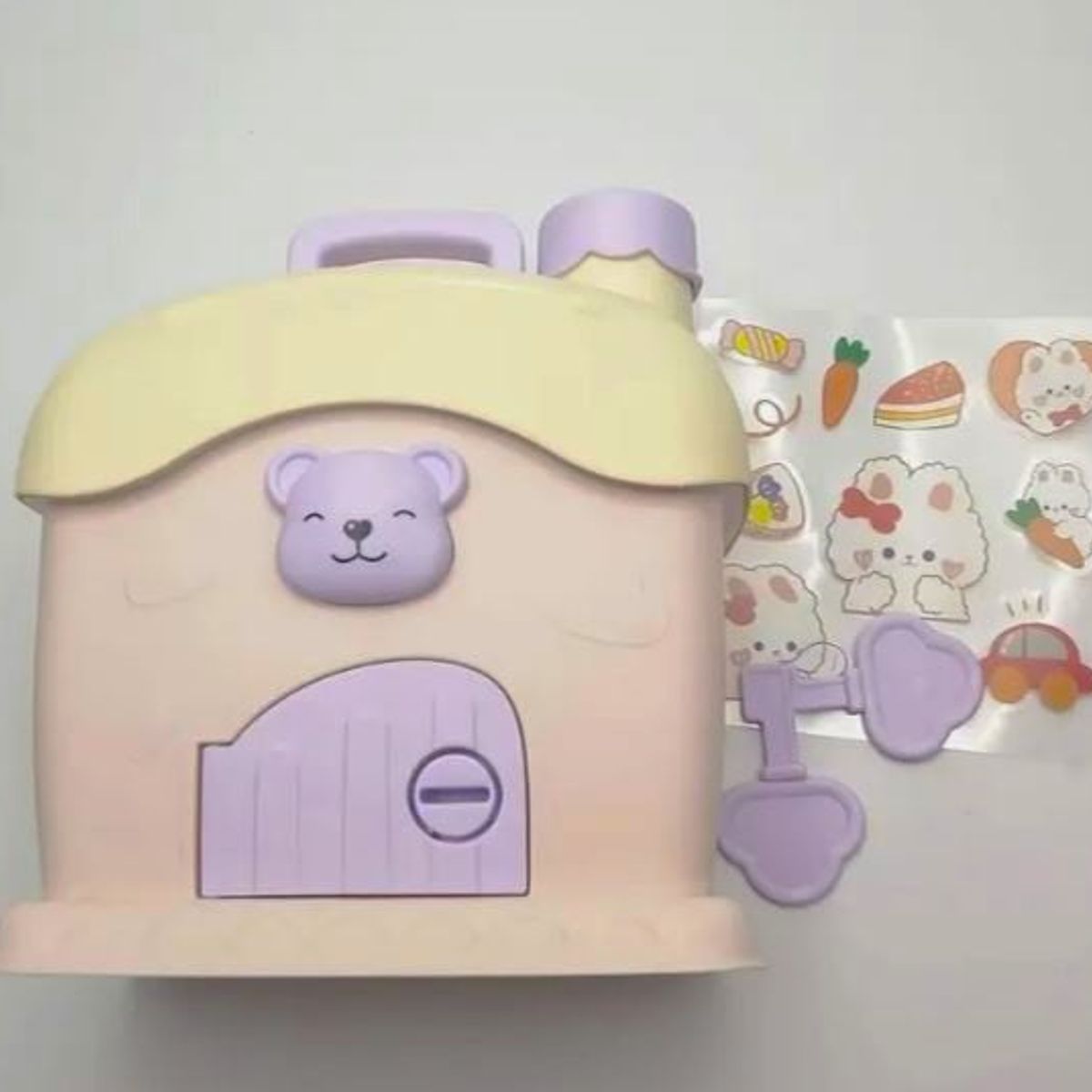 GENERICO - ALCANCIA CASA DE OSO ROSADO CON STICKERS