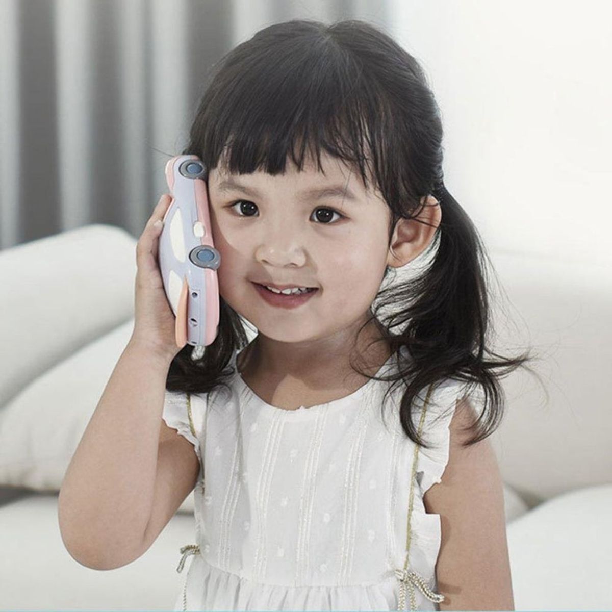 MINARI - Teléfono Musical Carro con Proyector de Estrellas Rosado