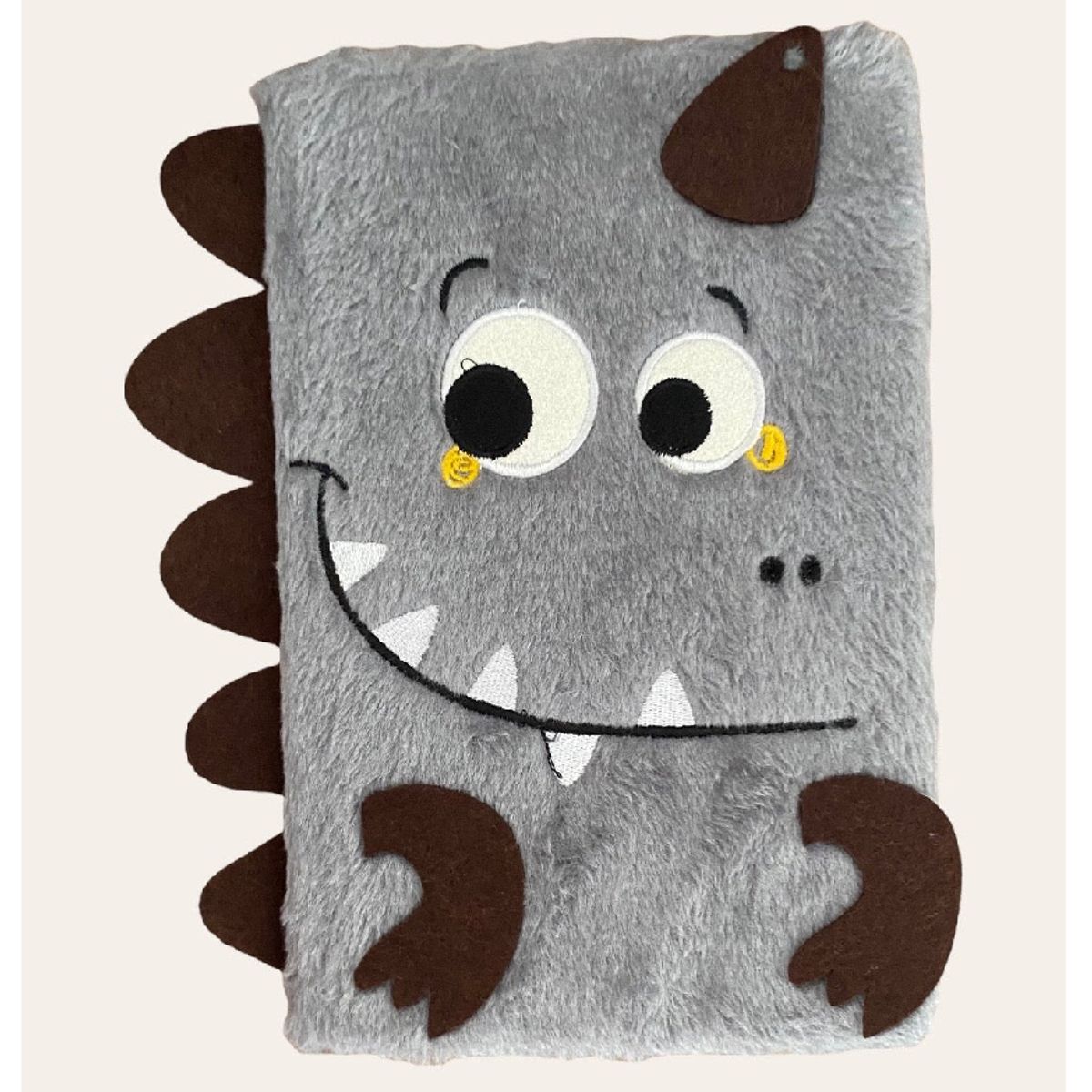 GENERICO - Cuaderno a Rayas Peluche Dinosaurio Gris