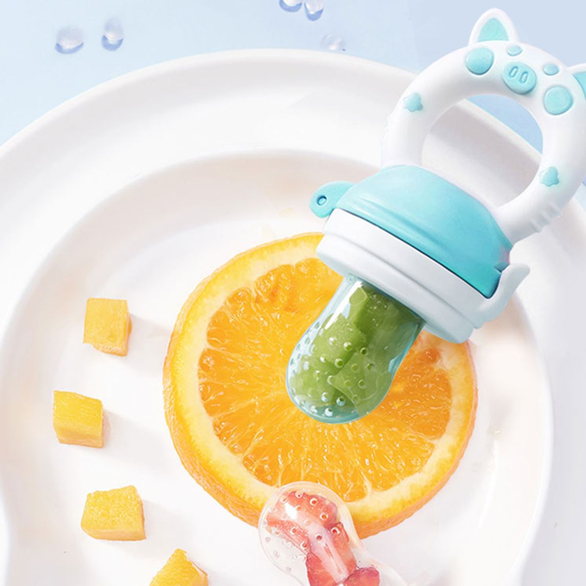 BABYKISS - CHUPON ALIMENTADOR PARA BEBE DE SILICONA SIN BPA CELESTE