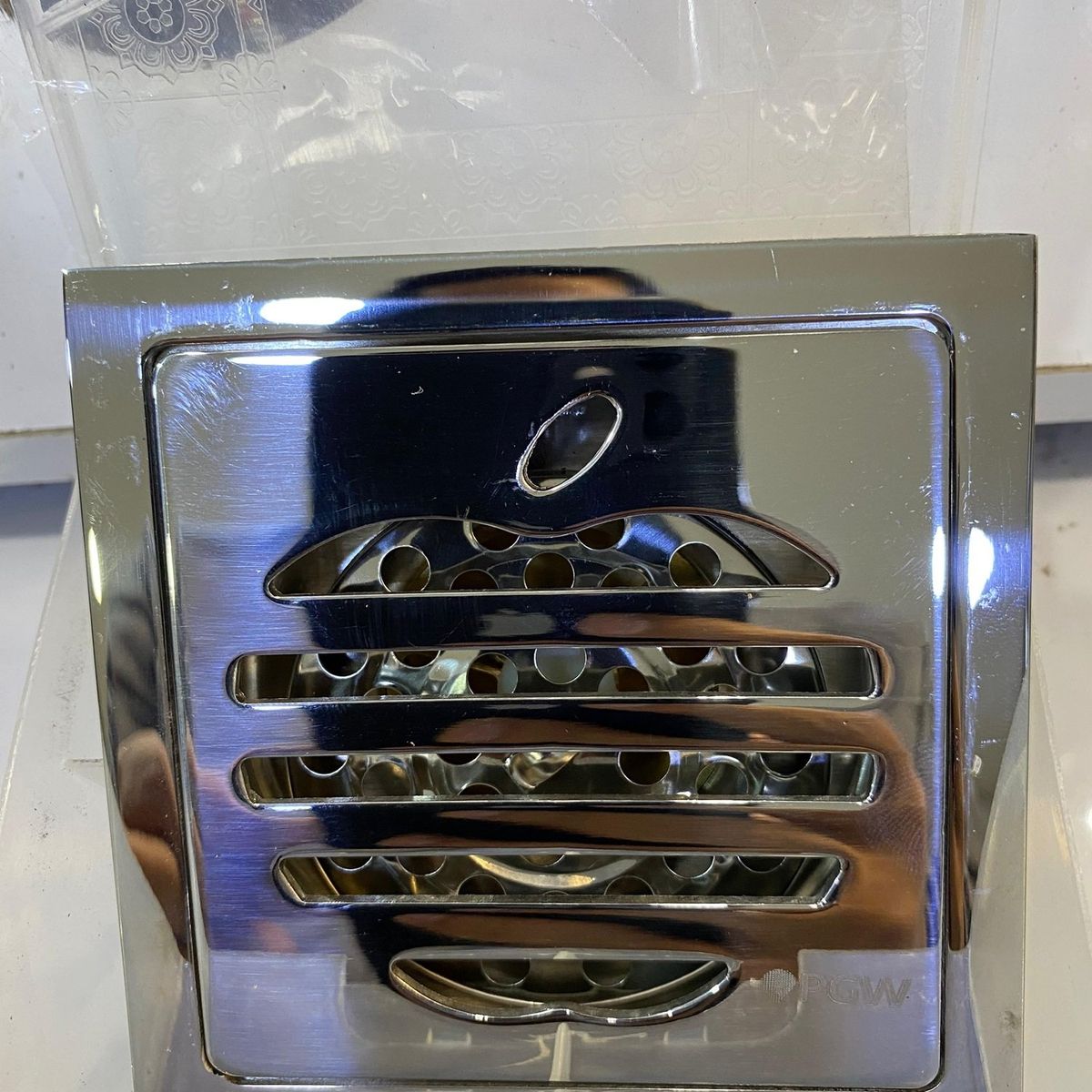 PGW - Sumidero de Piso Cuadrado -Elegante - Acero Inoxidable - Figura Apple