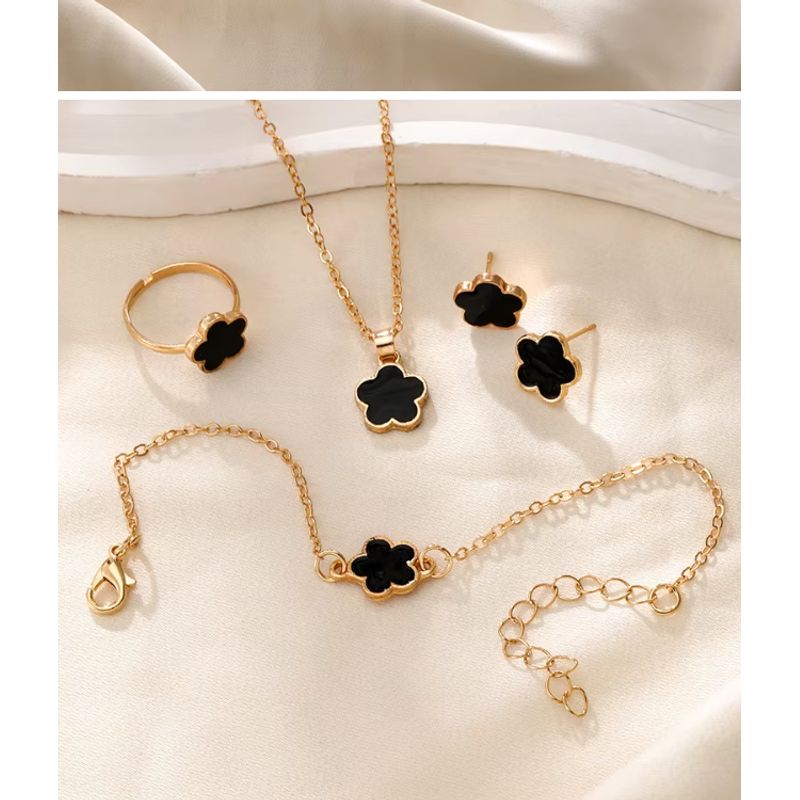 GENERICO - Set de  collar pulsera aretes sortija dorado flores -negro