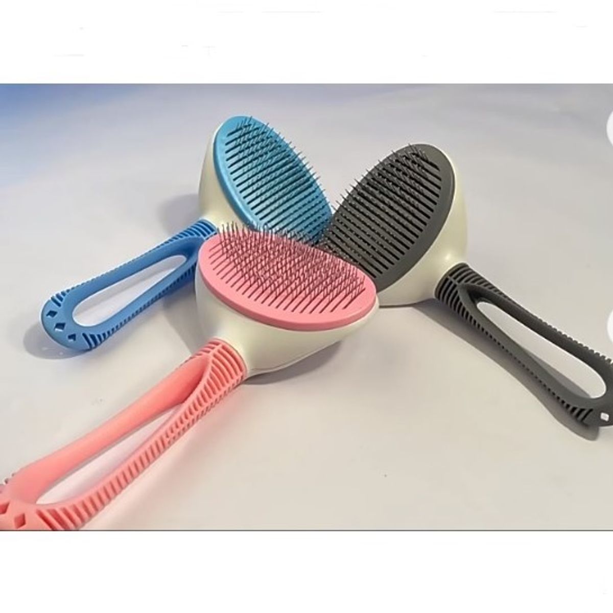 GENERICO - CEPILLO REMOVEDOR DE PELOS PARA MASCOTAS ROSADO