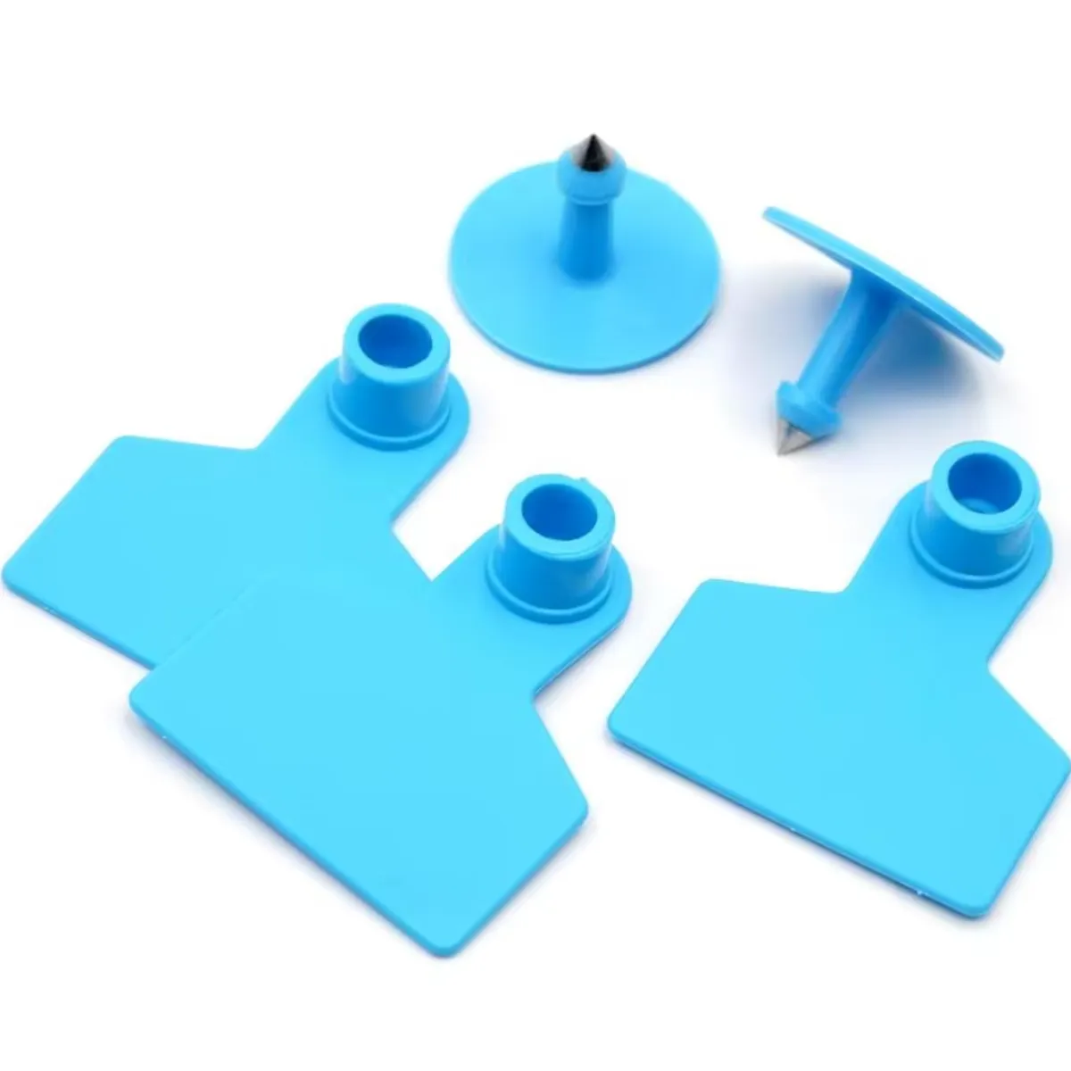 GENERICO - PACK DE 100 CROTAL ARETE PARA CERDO CELESTE 4X5 CM SIN NÚMERO