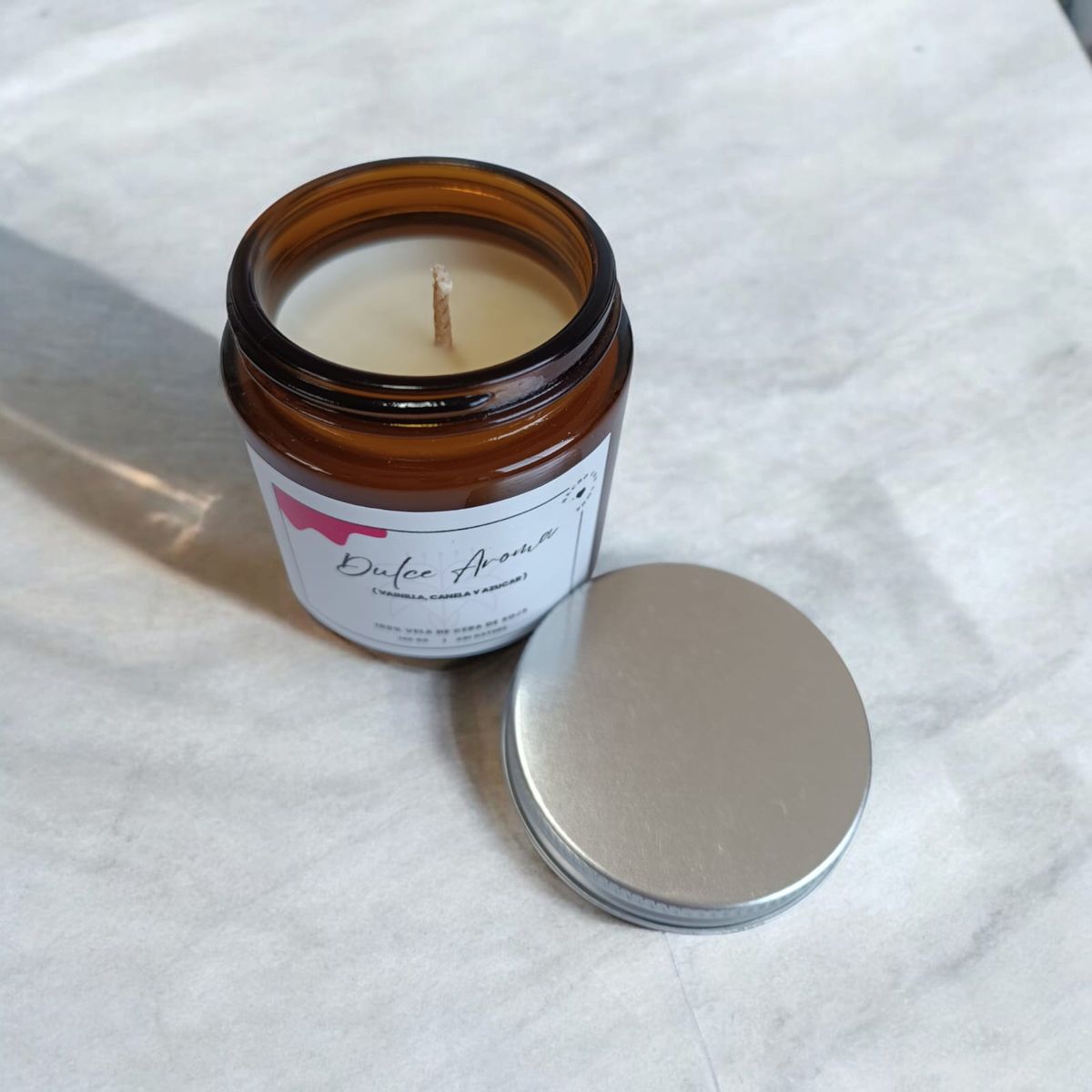 GENERICO - VELA AROMATICA DE CERA DE SOJA VAINILLA CANELA  Y PASAS 100 GR