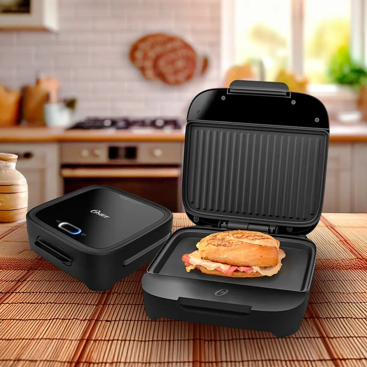 OSTER - Sandwichera Oster compacta con platos hondos CKSTSM400 053