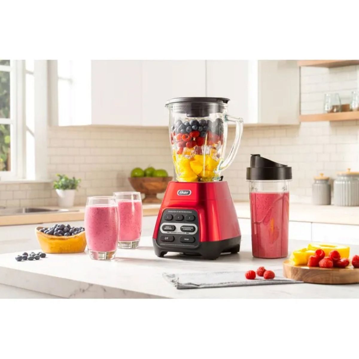 OSTER - Licuadora Oster Tecnología Reversible y vaso Blend-N-Go BLSTPYG1310RBG