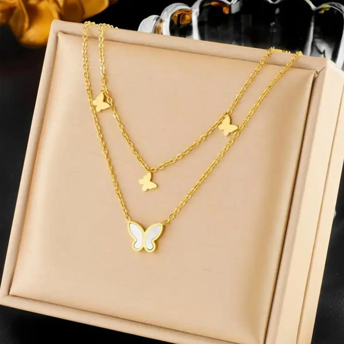 GENERICO - Collar y aretes doble caida modelo mariposa