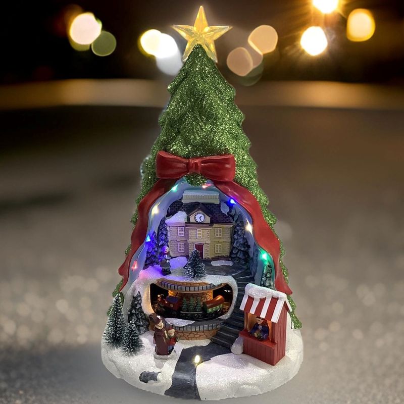 GENERICO - Villa de arbol navideño con estrella y tren rodando