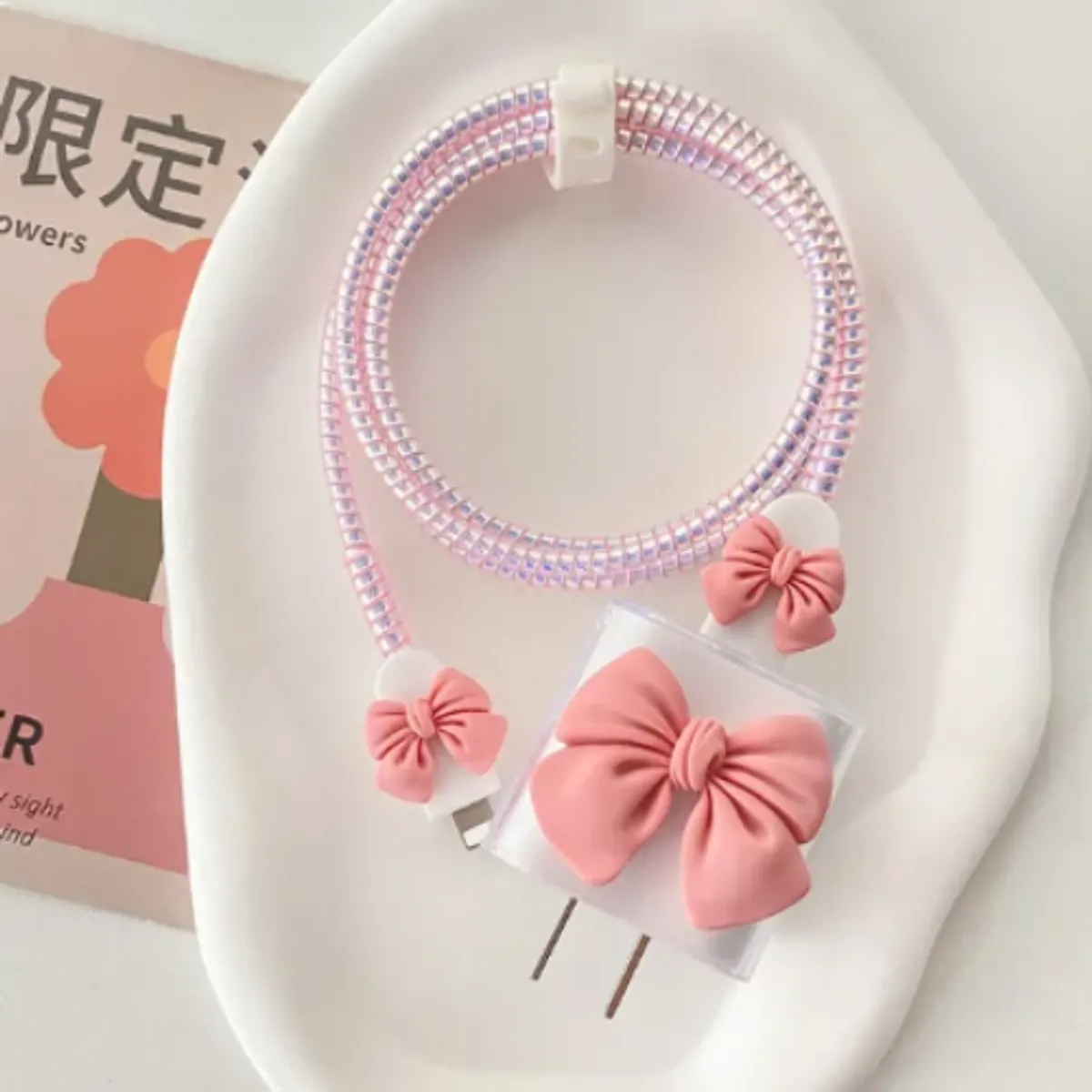 GENERICO - Protector o cases de cargador  para Iphone (Lazo Rosado)