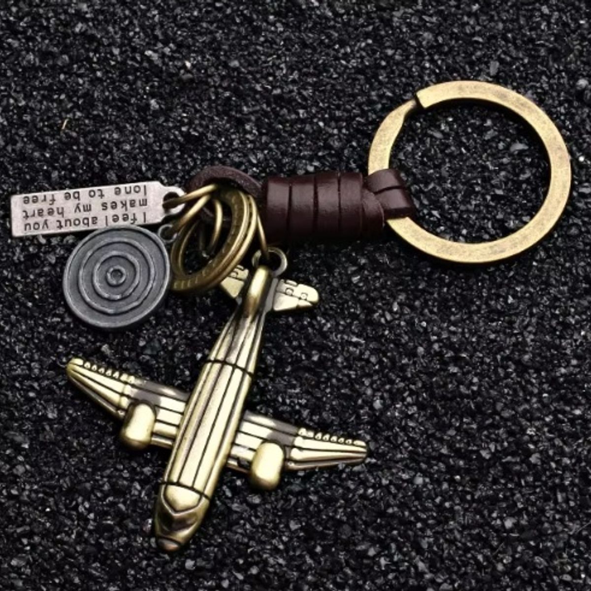 GENERICO - LLAVERO DE METAL Y CUERO AVION