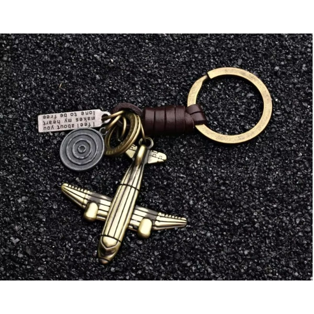 GENERICO - LLAVERO DE METAL Y CUERO AVION