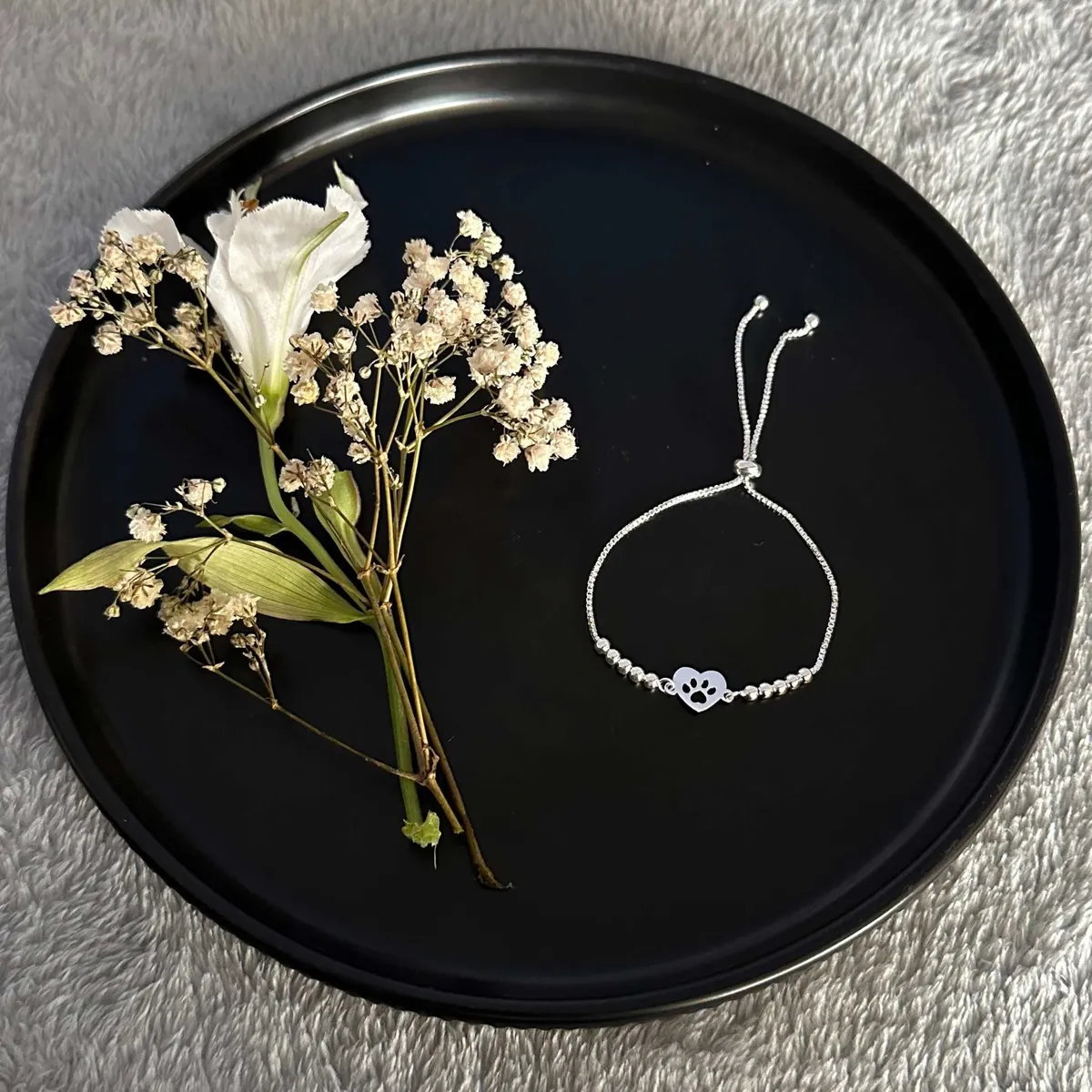 GENERICO - Pulsera regulable con dije corazón huellita en plata