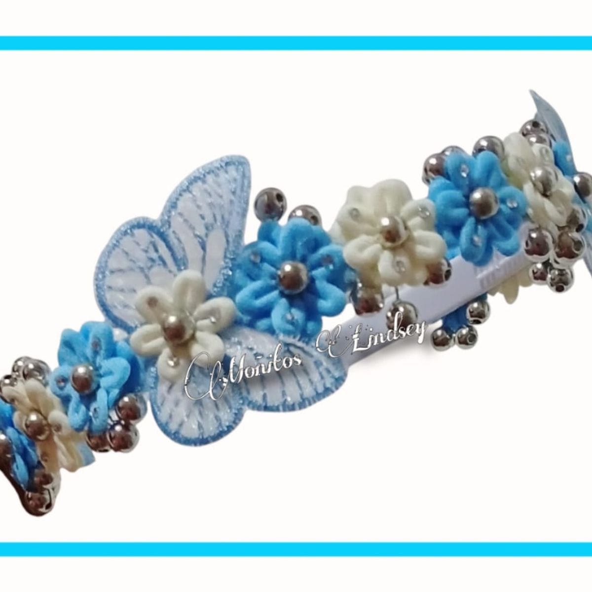 GENERICO - Vincha Flores CELESTE - Moñitos Lindsey