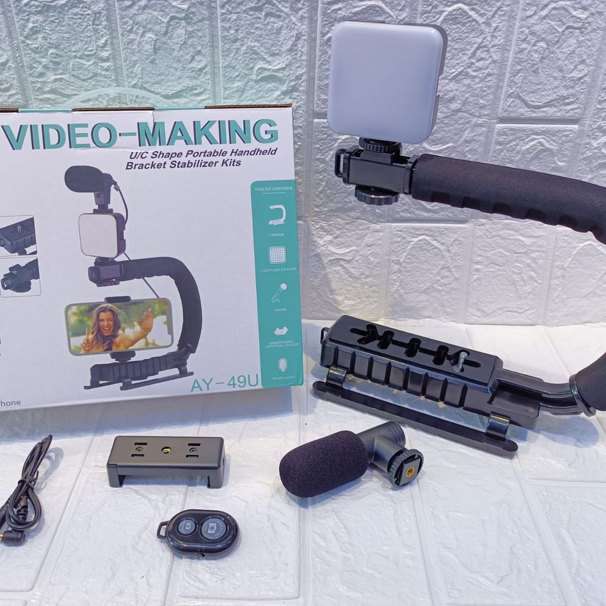 GENERICO - Estabilizador para Cámara y Celular para Grabación Vlogger AY-49U