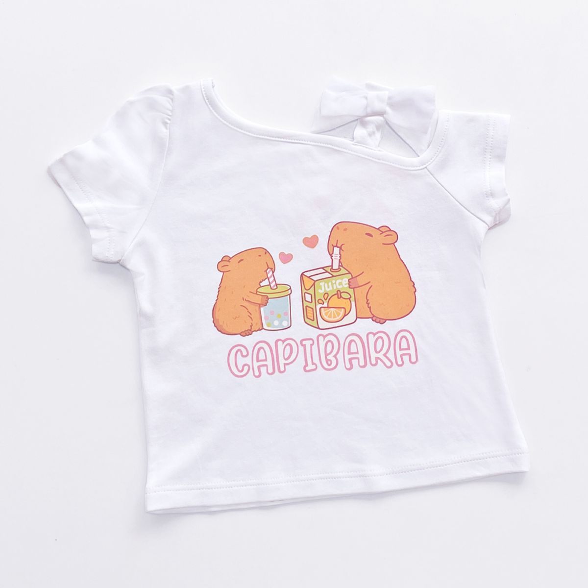 KIDS MASHMELO - POLO PARA NIÑA ASIMETRICO ESTAMPADO DE CAPIBARA KIDS MASHMELO