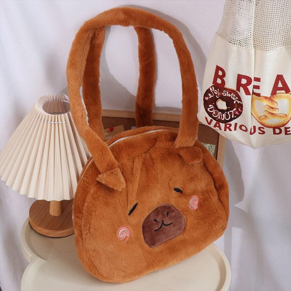 GENERICO - CARTERA Y MORRAL CAPIBARA MUSICAL