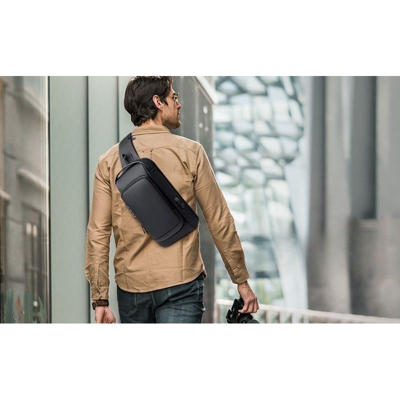 GENERICO - PECHERA MOCHILA MORRAL CRUZADO CROSSBODY ANTIRROBO USB MOKA