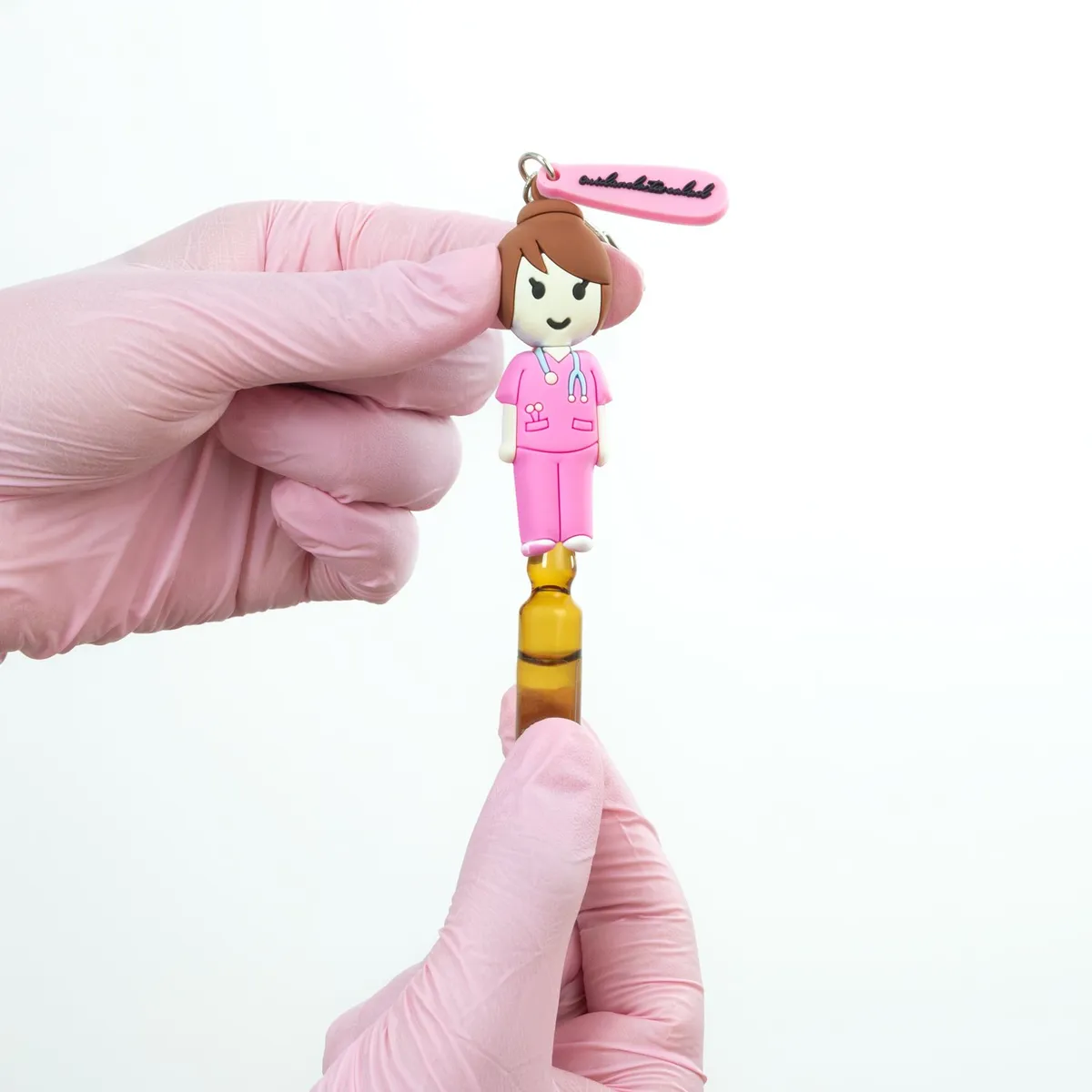 GENERICO - Llavero Rompe Ampolla Kamed Diseño Enfermera Traje Fucsia Chic