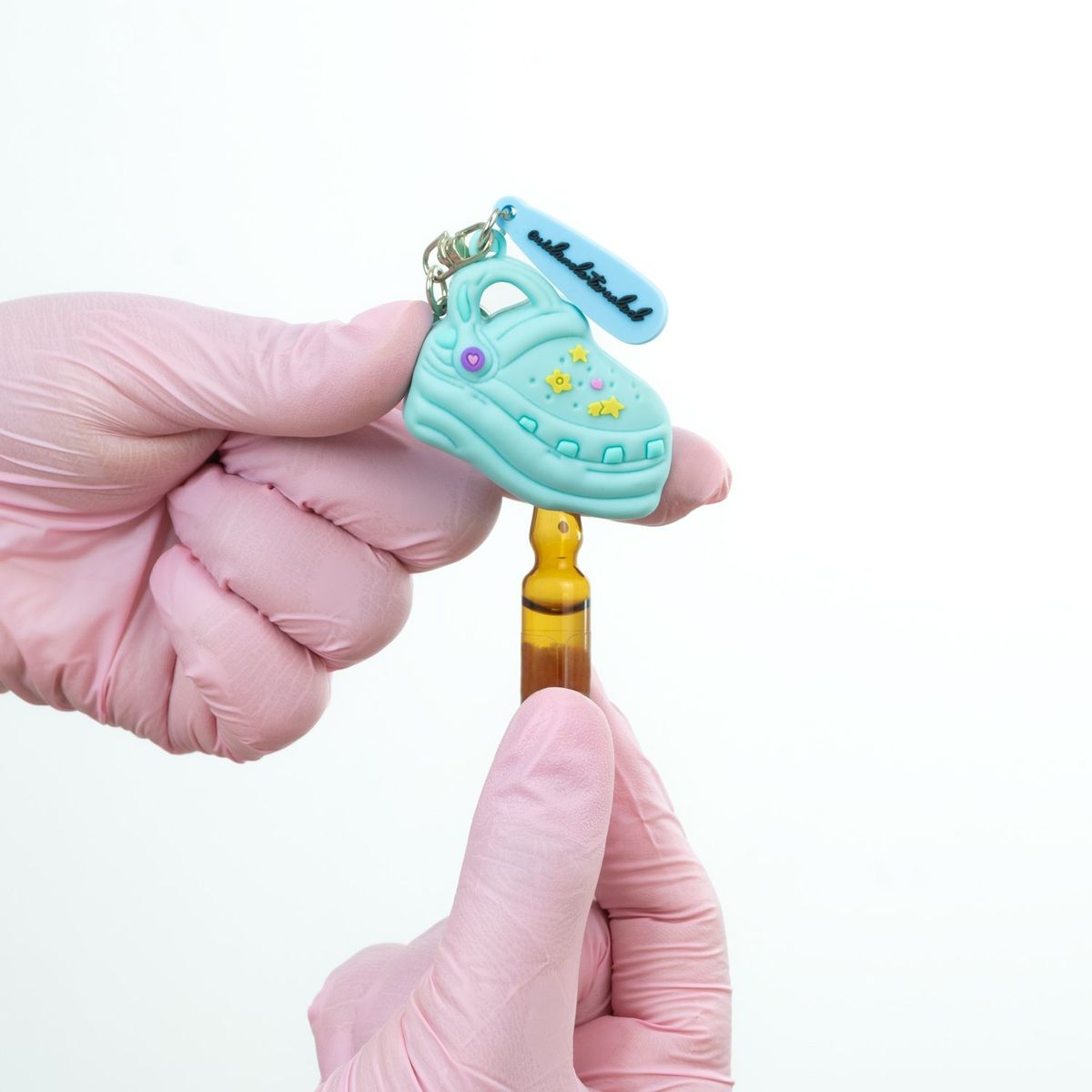 GENERICO - Llavero Rompe Ampolla Kamed Diseño Mini Crocs