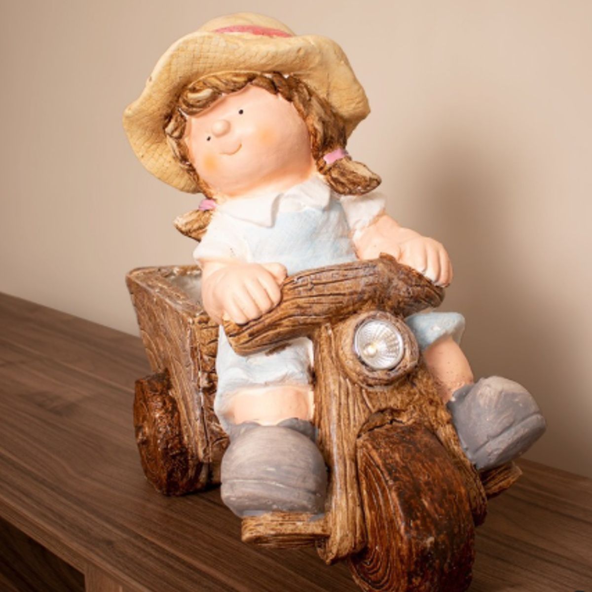 GENERICO - Maceta de niña en triciclo